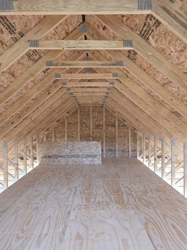 Attic roof trusses and floor sheathing on a new build